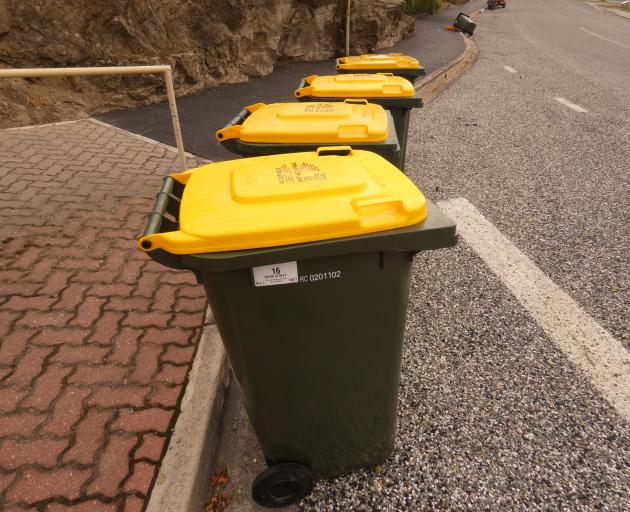 The recycling wheelie bins were out in Alexandra on Wednesday but their contents are likely to be...