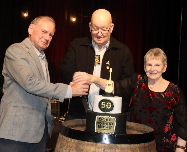 Cutting the 50th anniversary cake of the Gore Country Music Club (are from left) the inaugural...