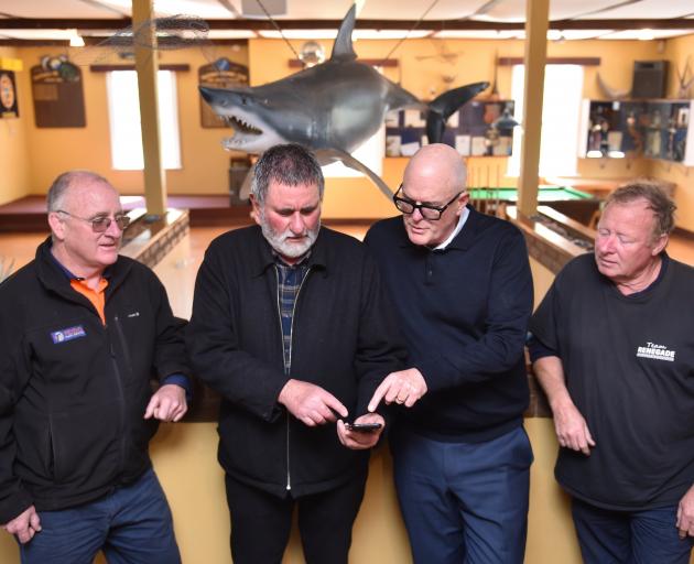 Tautuku Fishing Club's Mike Todd (left), Brett Bensemann and Ian Gunion (right) show National's...