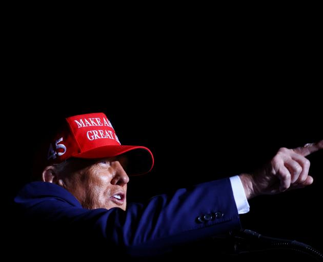 Former US President Donald Trump attends a pre-election rally to support Republican candidates in...