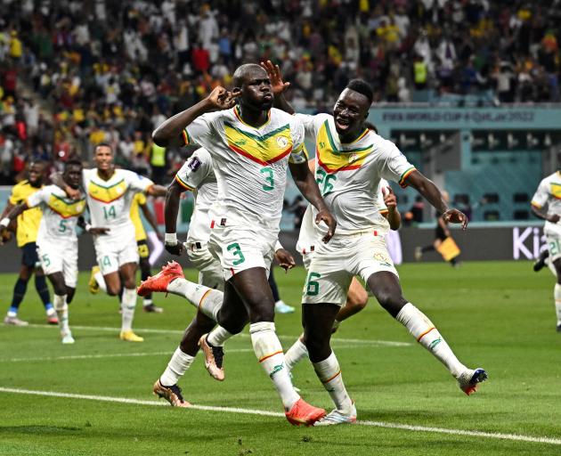 Senegal's Kalidou Koulibaly celebrates scoring his team's second goal. Photo: Reuters