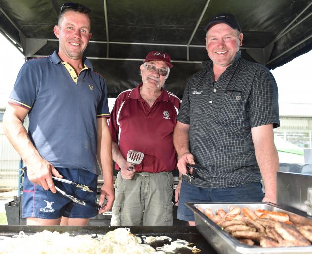 Cooking up a storm at the Silver Fern Rally pit-stop in Clydevale yesterday are (from left) Todd...