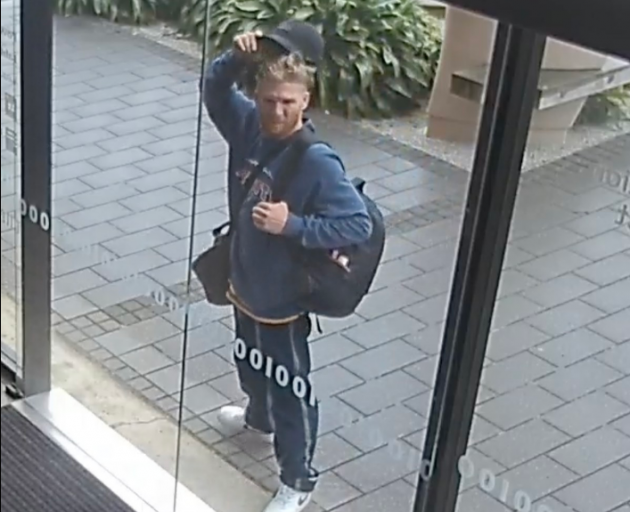 Dunedin police say they believe the two men pictured here and below, allegedly stealing an e-bike...