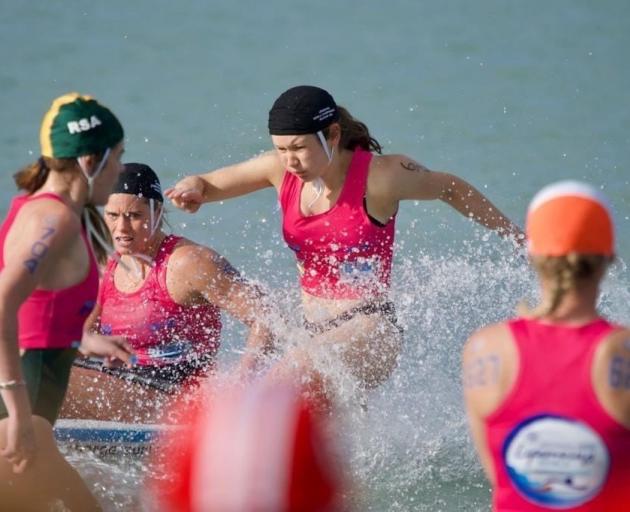Rosie Falcous (centre), of Otago Girls’ High School, is a talented surf life-saver whose ambition...