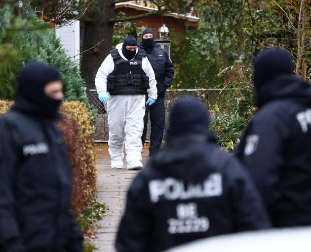 German police search a property in Berlin as part of the raids. Photo: Reuters
