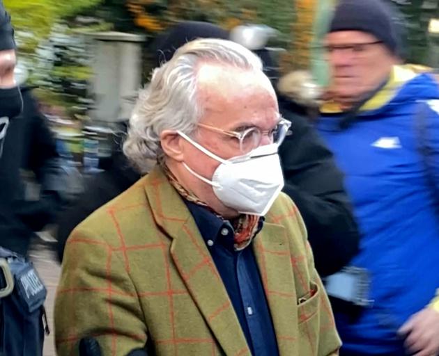 Police escort Prince Heinrich XIII in Frankfurt, Germany after 25 suspected members and...