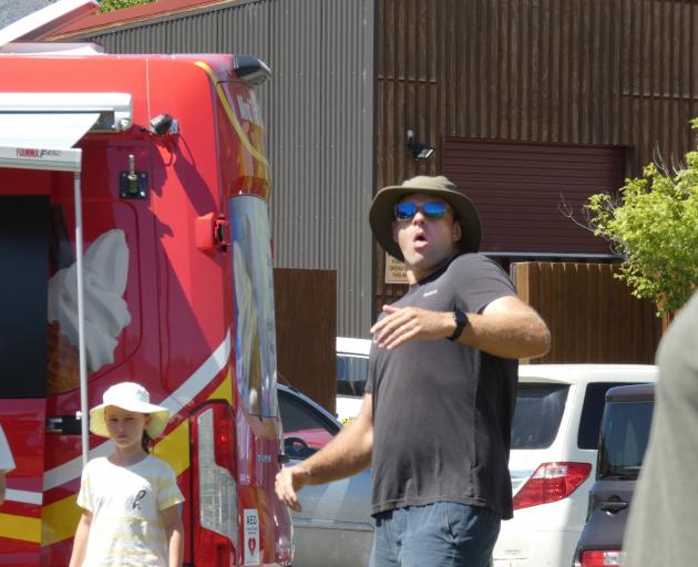 New Zealand cherry spitting record holder Aaron Collins competes in the annual contest in...