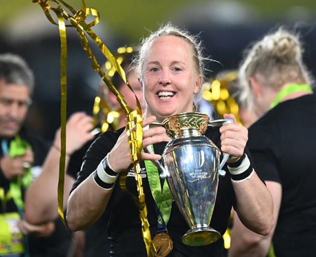 Kendra Cocksedge with the Rugby World Cup trophy after beating England in the final at Eden Park...