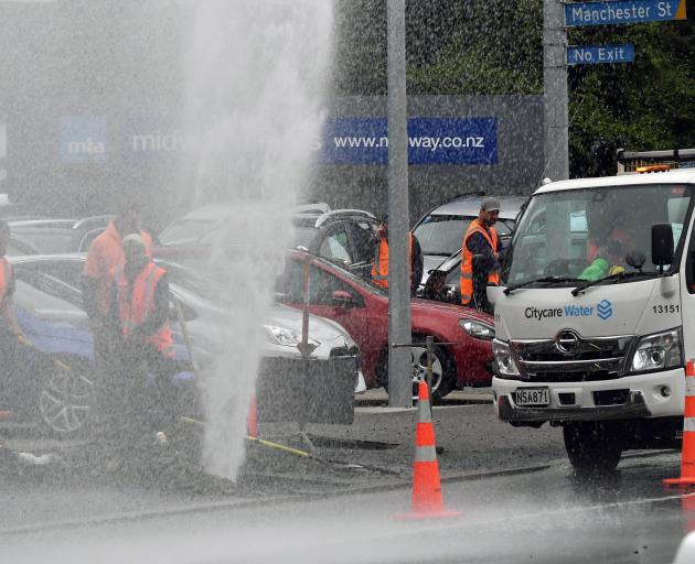 The burst water main caused excitement for in Kaikorai Valley Road this afternoon. Photo: Stephen...