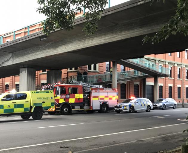Police fire and ambulance staff attend the scene after a man fell to his death in Cumberland St...