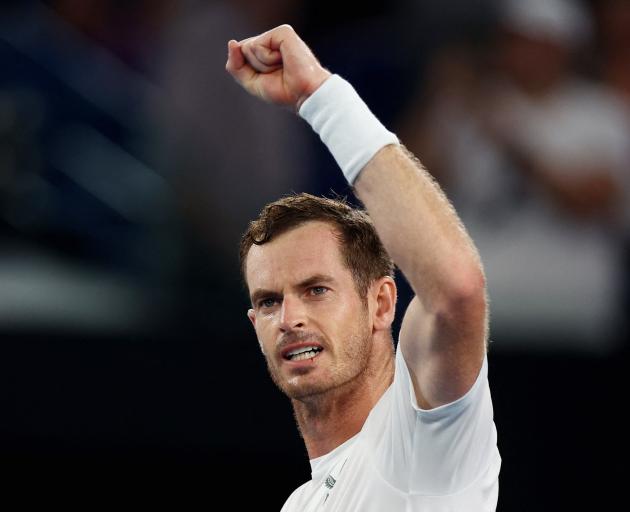 Andy Murray celebrates winning a tough match against Italy's Matteo Berrettini at Rod Laver Arena...