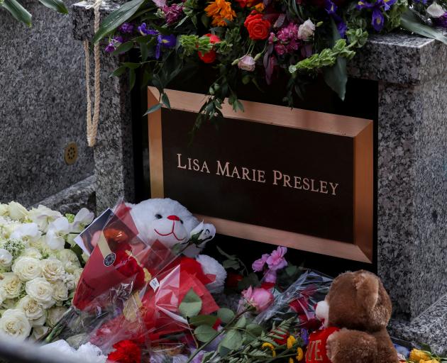 Lisa Marie Presley was buried before the memorial service alongside the grave of her son,...
