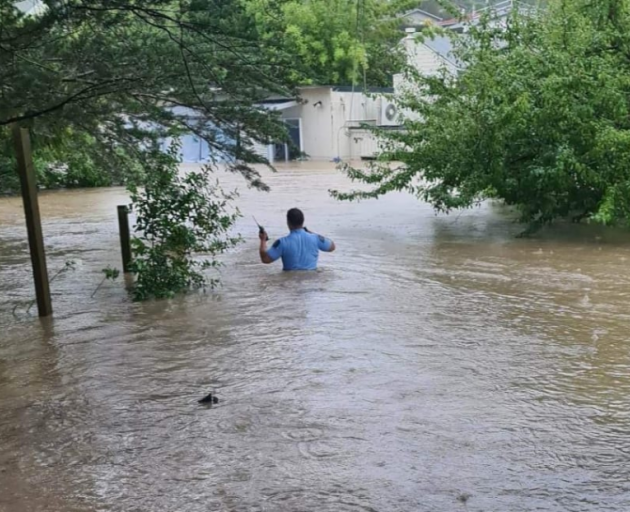 Flooding on Candia Road in Henderson Valley, west Auckland. Photo: Supplied via RNZ