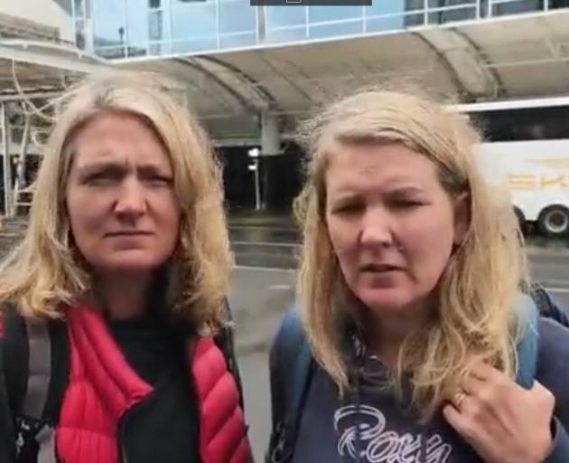 Emma and Sarah Hart outside Auckland international terminal on Saturday morning. PHOTO: SUPPLIED ...