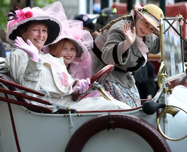 Sitting in their 1911 Clement Bayard (from left) Tiffany Armiger, Willow Armiger and Kaley...