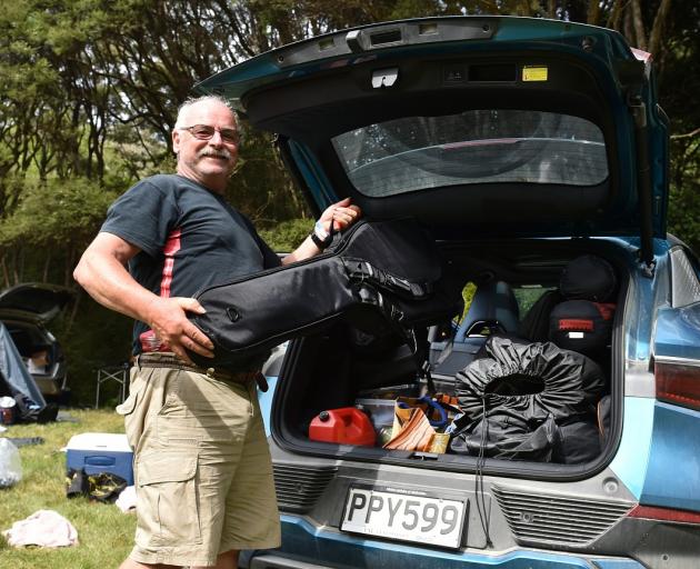Blair Anderson, of Christchurch, packs up yesterday after attending his 16th Whare Flat festival.