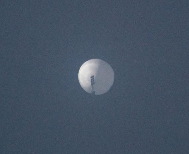 A Chinese balloon flies in the sky over Billings, in the US state of Montana. Photo: Chase Doak...