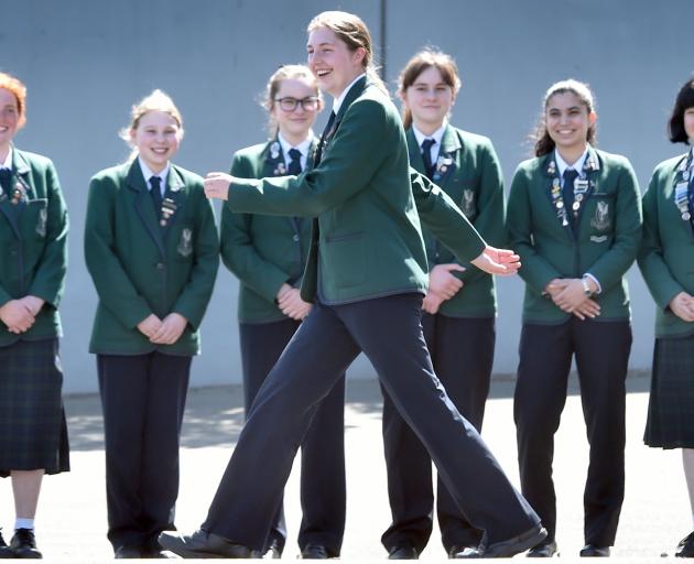 Showing off the new trousers available for Columba College pupils to wear is Poppy Edmond (14) in...