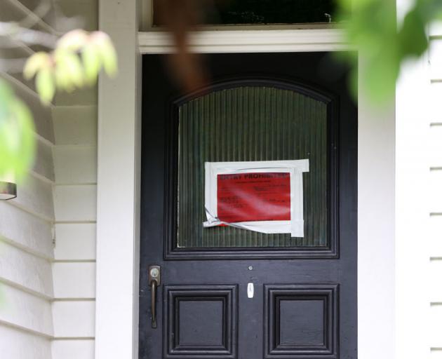 At least 140 of Auckland's flood-damaged homes have been red stickered, meaning they are...
