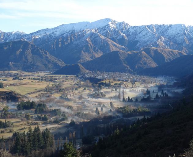 Smoke and fog lingers over Arrowtown on a winter morning. PHOTO: ODT FILES
