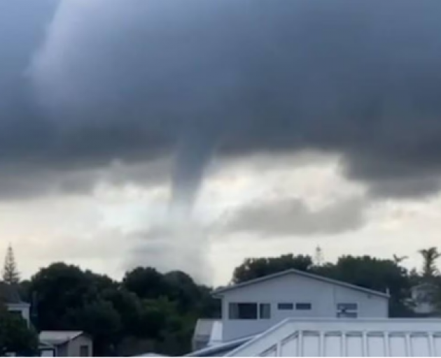 A tornado at Waihi Beach damaged houses and saw power cut to hundreds. Photo: Soleil Hefferen via...
