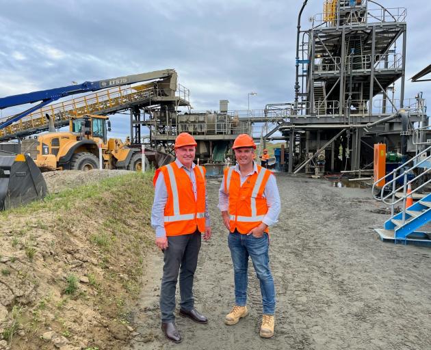 Buller Mayor Jamie Cleine with Westland Mineral Sands director Ray Mudgway at the new mine site...