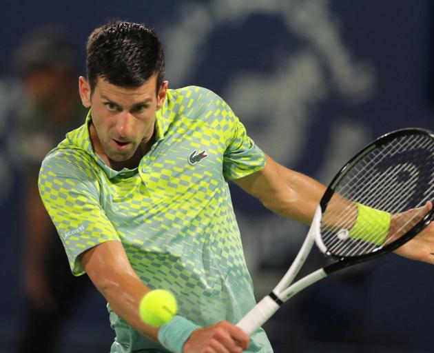 Serbia's Novak Djokovic in action during his semi final match against Russia's Daniil Medvedev at...