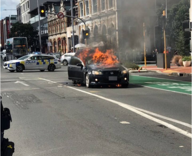 A car has burst into flames on Quay Street in central Auckland. Photo: NZ Herald