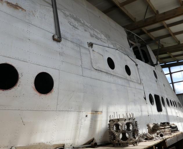 The gigantic fuselage of a Sunderland flying boat that once serviced the island is being restored.
