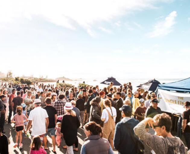Crowds flock to Sumner for a previous Single Fin Mingle. Photo: Cam Hay