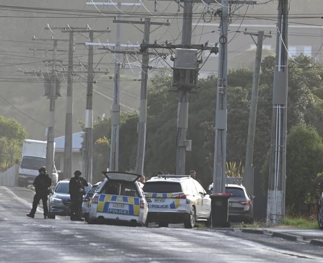 Police and members of the Armed Offenders Squad on Brighton Rd. Photo: Craig Baxter