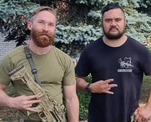 Kane Te Tai (right) pictured with Kiwi fighter Dominic Abelen, who was killed in Ukraine in...