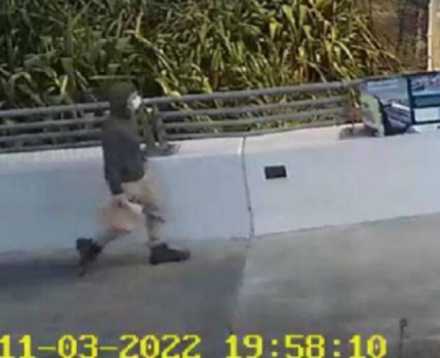 This man walking on the Sandhurst Drive overbridge is believed to be missing Tauranga doctor...