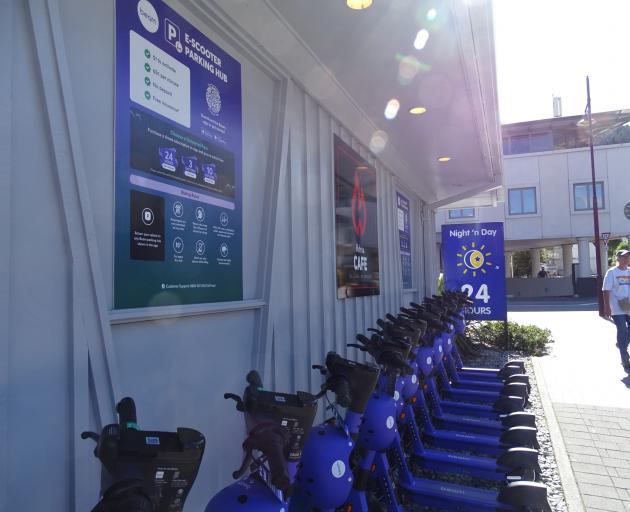 Beam e-scooters line up for their first day of duty outside Night ‘n Day Camp St store yesterday....