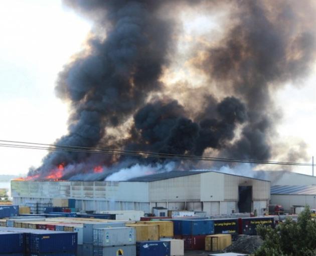 Flames and black smoke coming from the storage facility in Invercargill. Photo: Supplied/Debra...