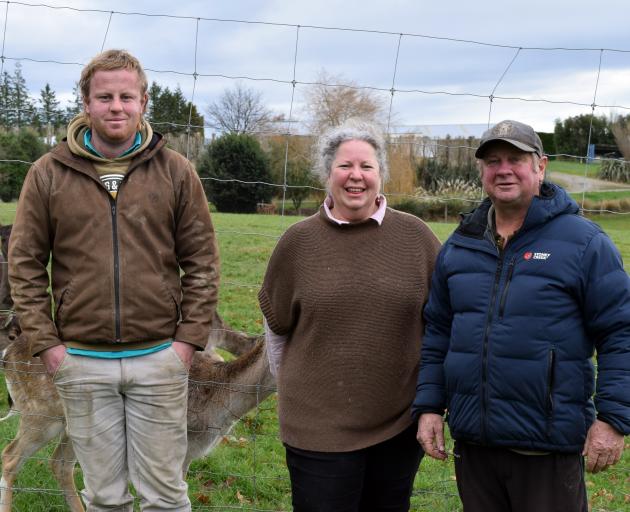 Red deer milk produced by Chris McIntyre (left) and his parents Sharon and Peter McIntyre on...