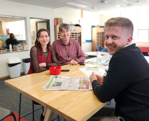 Secondary school teachers Prue Dreaver Stimpson, Nick Cox and Tim Atkins in the staffroom at...