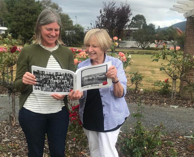 Standing in the Green Island Memorial Gardens, Lucy Summers (left) and Hazel Mihaka check the...