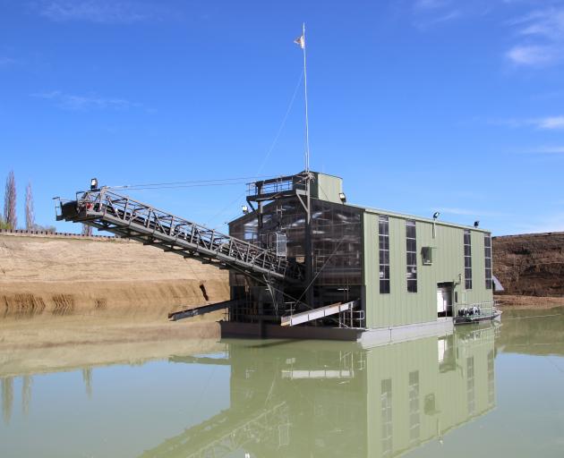 Using a floating dredge at a proposed gold mine in Millers Flat would significantly reduce the...
