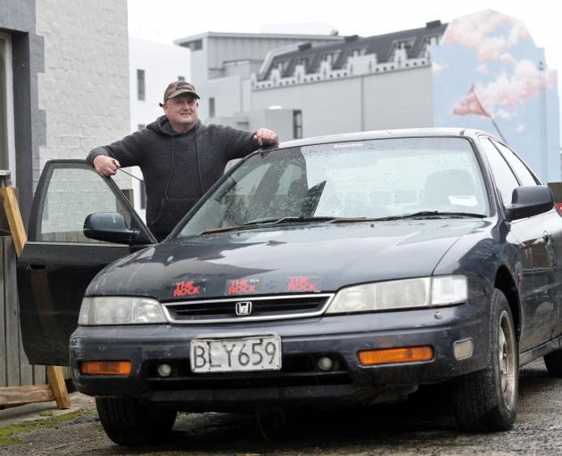 Michael MacKay with his returned car yesterday. PHOTO: LINDA ROBERTSON