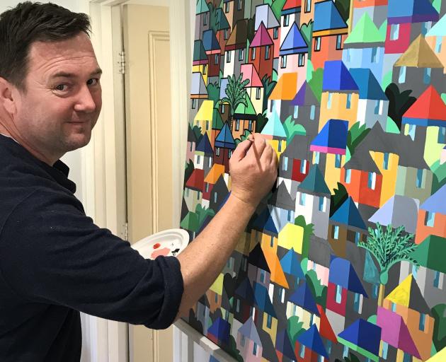 Artist Nic Dempster works on one of his creations in his Flag Swamp studio. PHOTOS: STEVE HEPBURN