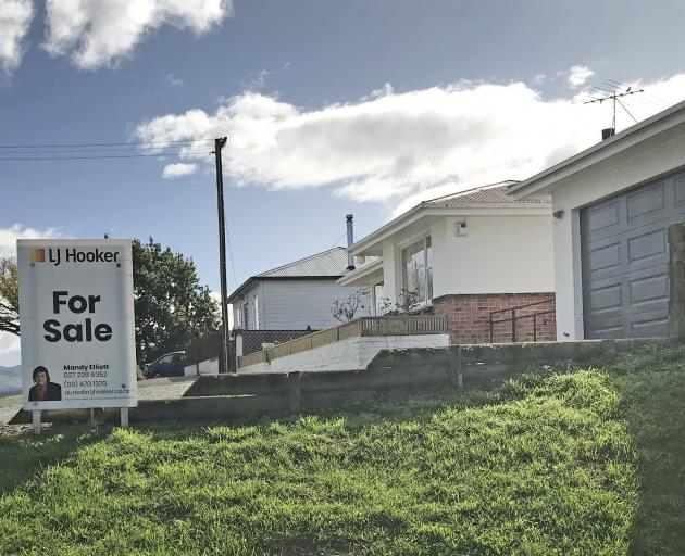 Signs advertise houses for sale in East Otago but few are available to rent. PHOTO: STEVE HEPBURN
