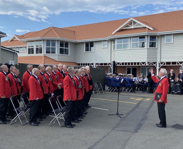The Dunedin RSA Choir led the crowd in singing the national anthems of New Zealand and Australia,...