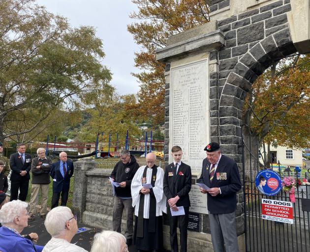 Leading the rededication ceremony for the North East Valley War Memorial Archway were (from left)...