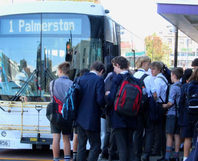 A large crowd of school children gather at Dunedin’s bus hub to get on the No 1 bus to Palmerston...