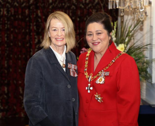 Receiving her investiture from Governor-General Dame Cindy Kiro at Government House in Wellington...