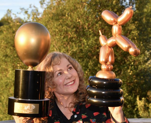 Delighted national winner Pippity-Pop (Pip Milford-Hughes) with her winning trophy and a balloon...