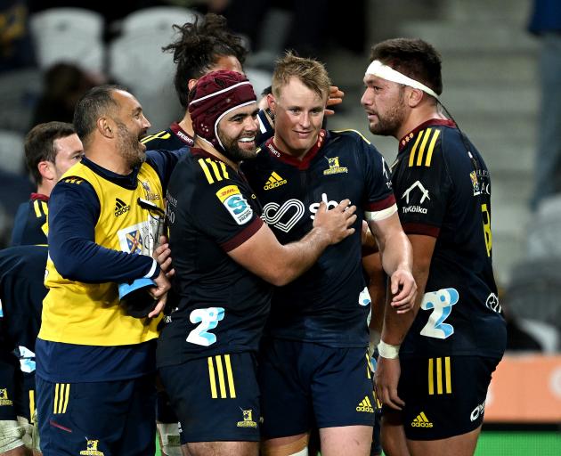 Sam Gilbert celebrates after kicking the winning penalty during the round 13 Super Rugby Pacific...