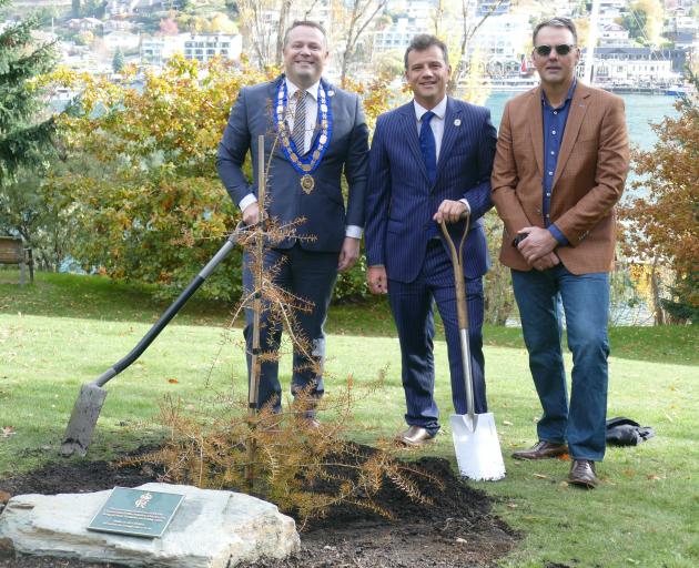 Pictured in front of a young totara, planted to commemorate the coronation of King Charles III at...