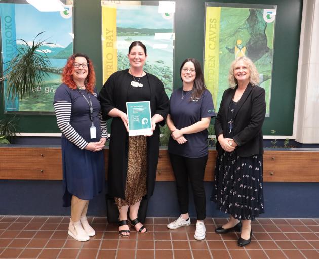 Posing for a photo are (from left) Te Rourou One Aotearoa Foundation head Kirsty Buggins,...